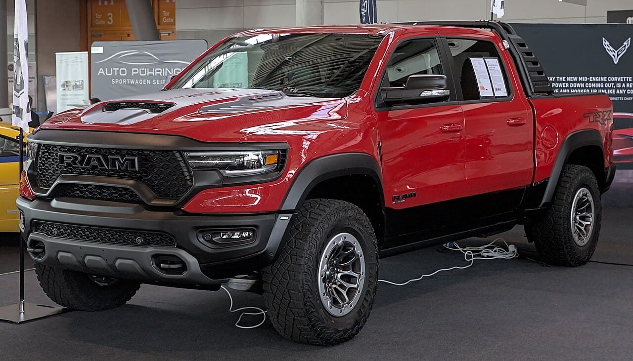 Front three-quarter view of a red Ram 1500 TRX at the Retro Classics 2022 show.